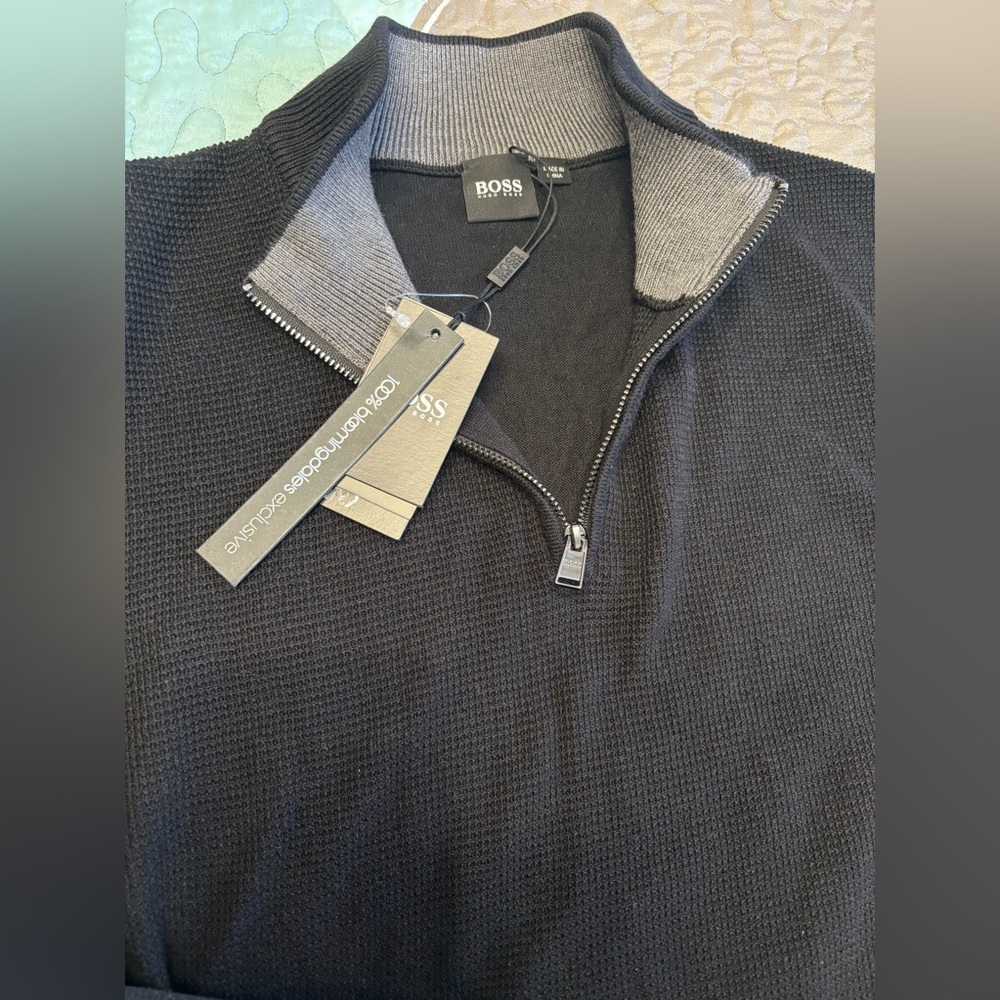 Men’s Hugo Boss sweater size Large Black color with Grey stripes on both sides.